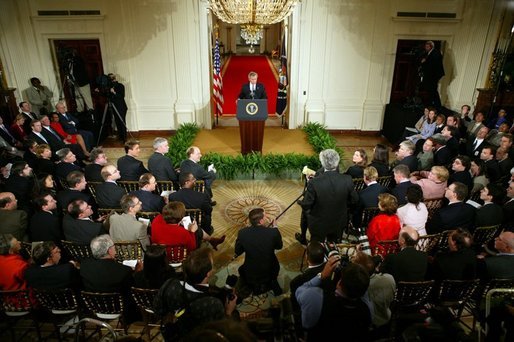 President George W. Bush responds to questions during a prime time press conference in the East Room of the White House on April 13, 2004. White House photo by Paul Morse