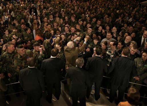 Vice President Dick Cheney shakes hands with troops and their families at Elmendorf Air Force Base in Anchorage, Alaska during a rally Friday afternoon, March 9, 2004. This was the first stop on the vice president's trip that will stop in Japan, China, and South Korea over the next week. White House photo by David Bohrer