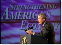 President George W. Bush delivers remarks on the economy in Des Moines, Iowa, Thursday, April 15, 2004. 