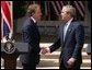 President George W. Bush and Prime Minister Tony Blair shake hands after a press conference in the Rose Garden of the White House on April 16, 2004. White House photo by Paul Morse.