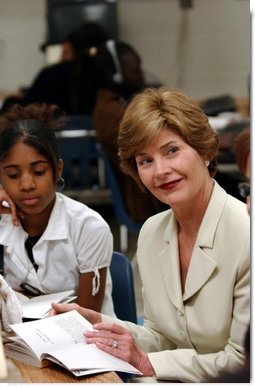 Laura Bush reads Mrs. Frisby and the Rats of Nimh with middle school students during Mrs. Hatty Drew’s reading lab at the Snowden School in Memphis, Tenn. Friday, April 23, 2004.  White House photo by Tina Hager
