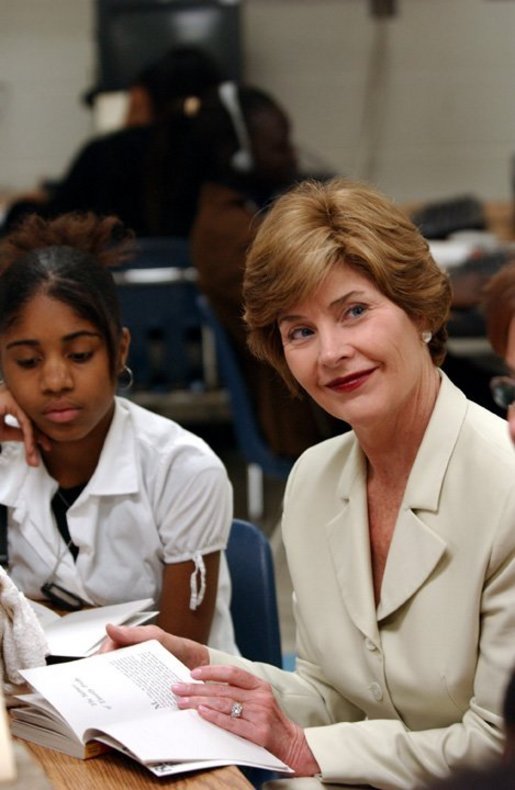 Laura Bush reads Mrs. Frisby and the Rats of Nimh with middle school students during Mrs. Hatty Drew’s reading lab at the Snowden School in Memphis, Tenn. Friday, April 23, 2004. White House photo by Tina Hager
