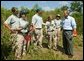 President George W. Bush talks with AmeriCorps volunteers at Rookery Bay National Estuarine Research Reserve in Naples, Fla., Friday, April 22, 2004. "Here at Rookery Bay, you see how important wetlands are to protecting 150 species of birds, and many threatened and endangered animals," said the President in his remarks. White House photo by Eric Draper