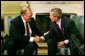 President George W. Bush meets with Swedish Prime Minister Goran Persson in the Oval Office Wednesday, April 28, 2004. White House photo by Paul Morse.