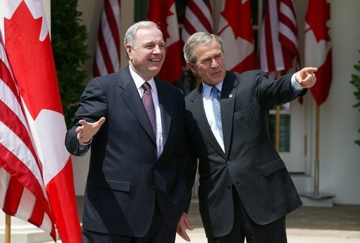 President George W. Bush and Canadian Prime Minister Paul Martin respond to questions from the press corps in the Rose Garden after a meeting at the White House on April 30, 2004. White House photo by Paul Morse