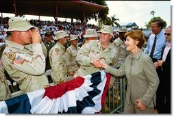Laura Bush thanks the men and women of the United States Military and the National Guard and Reserves for their service to our Nation during her remarks in Winter Haven, Fla., Saturday, May 1, 2004 "You are the face of American compassion abroad. You will have a greater impact than you can ever imagine on people that you will only know for a brief time. But you have delivered the greatest gift they will ever know -- you've sacrificed your own comfort, your own safety, and your own lives so that others might know freedom."  White House photo by Tina Hager