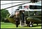 President George W. Bush waves from Marine One as he departs the White House Friday, May 7, 2004.  White House photo by Paul Morse
