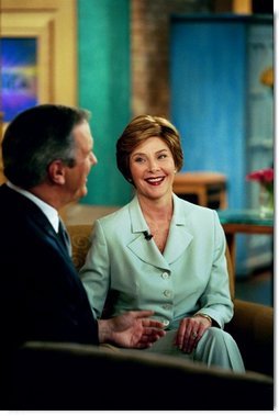 Laura Bush speaks with Charlie Gibson during a Good Morning America live interview at the ABC Studios in New York City, Monday, May 10, 2004.  White House photo by Tina Hager