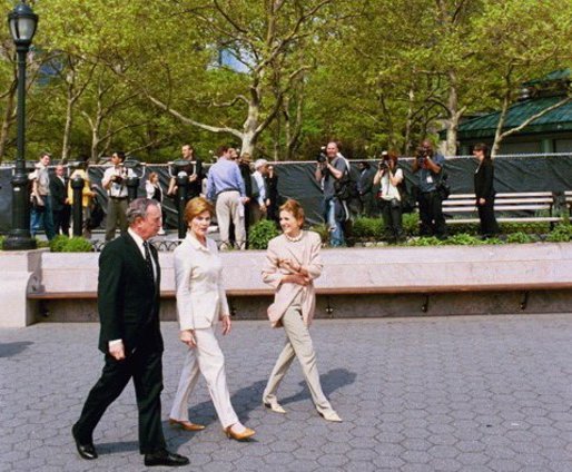 Laura Bush tours 'The Gardens of Remembrance' with New York City Mayor Michael Bloomberg and Mrs. Warrie Price, Founder and President of The Battery Conservancy in New York's Battery Park, Monday, May 10, 2004. 'The Gardens of Remembrance' honor the survivors, those who lost their lives and all those seeking solace and hope from the September 11th terrorist attacks. White House photo by Tina Hager.