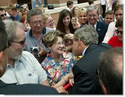 President George W. Bush greets the residents of Fort Smith, Ark., before heading back to Washington, D.C., Tuesday, May 11, 2004.  White House photo by Paul Morse