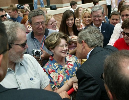 President George W. Bush greets the residents of Fort Smith, Ark., before heading back to Washington, D.C., Tuesday, May 11, 2004. White House photo by Paul Morse