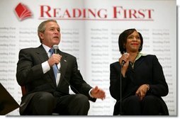 President George W. Bush participates in a conversation on Reading First and the No Child Left Behind Act with kindergarten teacher Cynthia Henderson at the National Institutes of Health in Bethesda, Maryland on May 12, 2004.  White House photo by Paul Morse