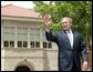 President George W. Bush waves to the audience before delivering remarks during the 50th anniversary of Brown V. Board of Education at the national historic site named in its honor in Topeka, Kan., Monday, May 17, 2004. White House photo by Eric Draper.