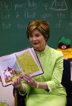 Laura Bush reads Arthur Writes a Story by Marc Brown to Ms. Valdez's first grade reading class at Reginald Chavez Elemantary School in Albuquerque, N.M., Thursday, May 20, 2004. During her visit, Mrs. Bush encouraged children to keep reading throughout the summer. White House photo by Tina Hager.