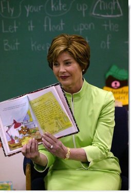 Laura Bush reads Arthur Writes a Story by Marc Brown to Ms. Valdez's first grade reading class at Reginald Chavez Elemantary School in Albuquerque, N.M., Thursday, May 20, 2004. During her visit, Mrs. Bush encouraged children to keep reading throughout the summer.  White House photo by Tina Hager