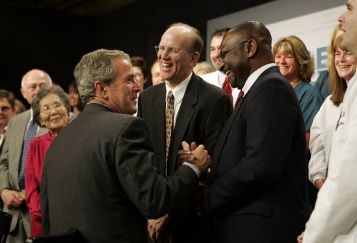 President George W. Bush greets the audience after participating in a conversation on health care and community health centers at Youngstown State University in Youngstown, Ohio, Tuesday May 25, 2004. White House photo by Paul Morse