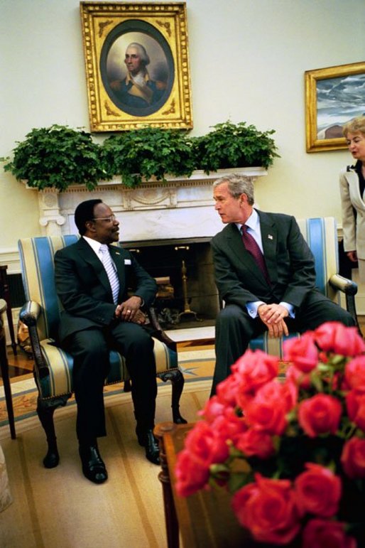 President George W. Bush and President Omar Bongo Ondimba of Gabon meet in the Oval Office Wednesday, May 26, 2004. White House photo by Eric Draper.