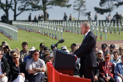 President George W. Bush addresses World War II veterans and families during the 60th anniversary of D-Day at the American Cemetery in Normandy, France, June 6, 2004. White House photo by Paul Morse.