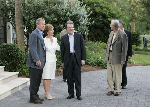 President George W. Bush and Laura Bush greet European Commission President Romano Prodi on his arrival to the G8 Summit on Sea Island, Ga., Tuesday, June 8, 2004. White House photo by Tina Hager