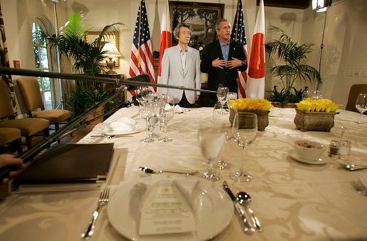 President George W. Bush and Japanese Prime Minister Junichiro Koizumi poses for photographs with during their working lunch at the G-8 Summit on Sea Island, Ga., Tuesday, June 8, 2004. White House photo by Eric Draper