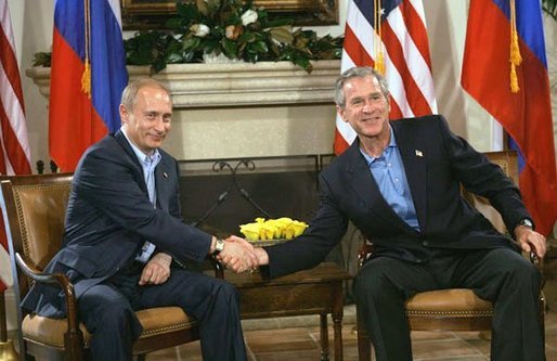 President George W. Bush shakes hands with Russian President Vladimir Putin during their bilateral meeting at the G-8 Summit in Sea Island, Ga., Tuesday, June 8, 2004. White House photo by Eric Draper