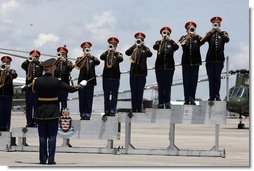 A band plays during the arrival ceremonies for the leaders of the G8 member nations at Hunter Army Airfield in Savannah, Ga., Tuesday, June 8, 2004.  White House photo by Paul Morse