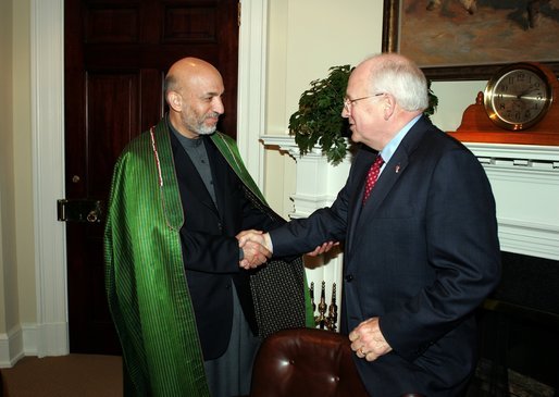 Vice President Dick Cheney greets President Hamid Karzai of Afghanistan in the Roosevelt Room in the West Wing Tuesday, June 15, 2004. White House photo by David Bohrer.