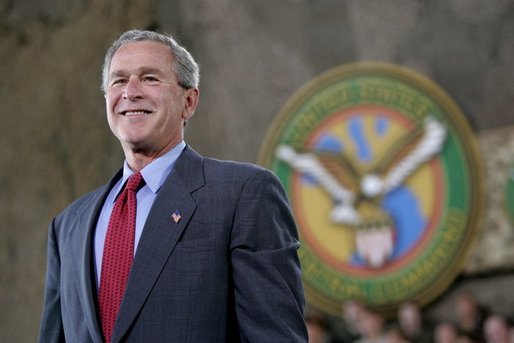 President George W. Bush reacts during his introduction at MacDill Air Force Base in Tampa, Florida, Wednesday, June 16, 2004. White House photo by Eric Draper.