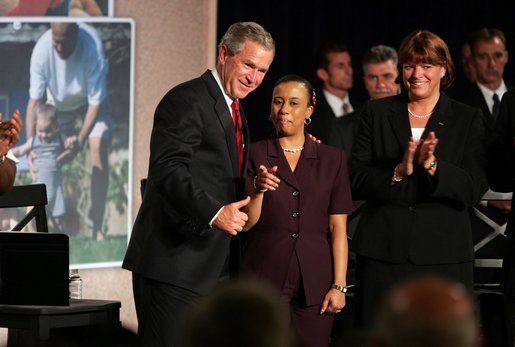 President George W. Bush reacts to family members of Tami Jordan after a conversation on compassion at the Hamilton County Alcohol and Drug Addiction Services Center in Cincinnati, Ohio on June 21, 2004. White House photo by Paul Morse.