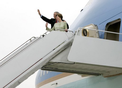 President George W. Bush and Laura Bush board Air Force One before departing Andrews Air Force Base en route to Shannon, Ireland, Friday, June 25, 2004. White House photo by Eric Draper.