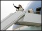 President George W. Bush and Laura Bush board Air Force One before departing Andrews Air Force Base en route to Shannon, Ireland, Friday, June 25, 2004. White House photo by Eric Draper.