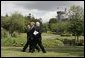 President George W. Bush walks with Prime Minister of Ireland Bertie Ahern, right, and President of the European Commission Romano Prodi on the way to their joint press conference at the Dromoland Castle in Shannon, Ireland, Saturday, June 26, 2004. White House photo by Eric Draper