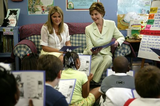 Laura Bush and her daughter Jenna read with a second grade class at Hueytown Elementary School in Birmingham, Ala., Wednesday, July 14, 2004. White House photo by Joyce Naltchayan.