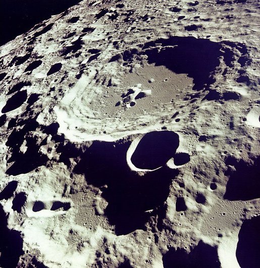 Crater 308 stands out in sharp relief in this photo from lunar orbit. Click for larger image. Photo credit: NASA.