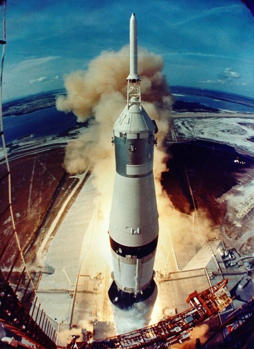 Smoke and flames signal the opening of a historic journey as the Saturn V clears the launch pad. Photo credit: NASA.