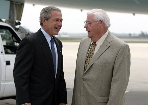 President George W. Bush meets with Freedom Corps greeter Dean Gesme Sr. after arriving in Cedar Rapids, Iowa on July 20, 2004. White House photo by Paul Morse