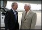 President George W. Bush meets with Freedom Corps greeter Dean Gesme Sr. after arriving in Cedar Rapids, Iowa on July 20, 2004. White House photo by Paul Morse