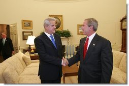 President George W. Bush meets with Prime Minister Adrian Nastase of Romania in the Oval Office Wednesday, July 21, 2004  White House photo by Eric Draper