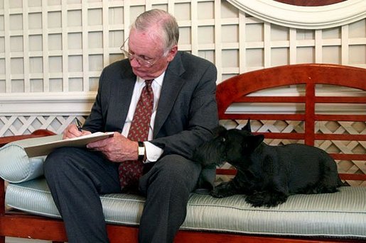 Barney observes astronaut Neil Armstrong respond to questions for "Ask the White House" in the White House Garden Room Wednesday, July 21, 2004. White House photo by Alex Cooney.