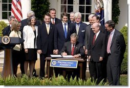 President George W. Bush signs S.15-Project Bioshield Act of 2004, in the Rose Garden Wednesday, July 21, 2004.  White House photo by Paul Morse