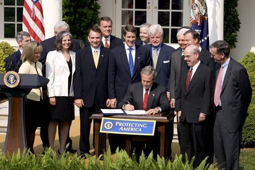 President George W. Bush signs S.15-Project Bioshield Act of 2004, in the Rose Garden Wednesday, July 21, 2004. White House photo by Paul Morse.