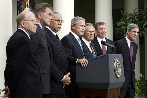 Standing with members of his national security team, President George W. Bush discusses America's intelligence reforms in the Rose Garden Monday, Aug. 2, 2004. White House photo by Paul Morse.