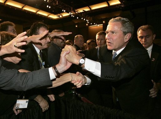President George W. Bush greets audience members after remarks to the 122nd Annual Knights of Columbus Convention in Dallas, Texas, Tuesday, Aug. 3, 2004. White House photo by Eric Draper.