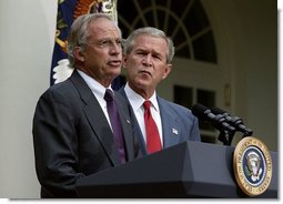 Standing with President George W. Bush, Rep. Porter Goss, R-Fla., addresses the media after the President nominated him to be the director of the CIA in the Rose Garden, Tuesday, Aug. 10, 2004.   White House photo by Joyce Naltchayan