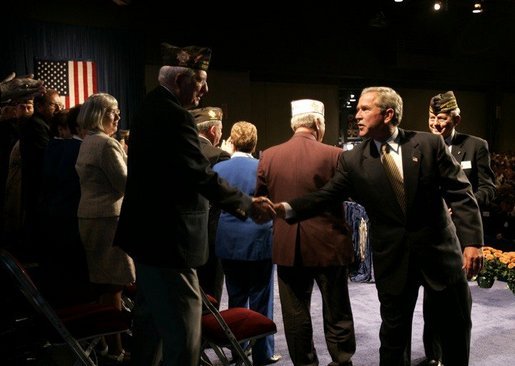 President George W. Bush greets veterans after speaking to the Veterans of Foreign Wars convention in Cincinnati, Ohio, Monday, Aug. 16, 2004. White House photo by Paul Morse.