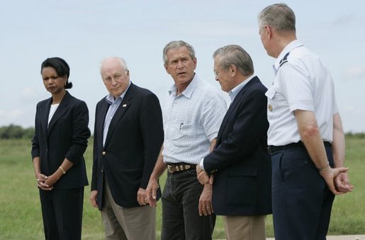 Standing with his national defense team, President George W. Bush talks with the press at Prairie Chapel Ranch in Crawford, Texas, Monday, Aug. 23, 2004. Pictured, from left, are: Dr. Condoleezza Rice, Vice President Dick Cheney, Secretary of Defense Donald Rumsfeld and Chairman of the Joint Chiefs of Staff General Richard Meyers. White House photo by Paul Morse.