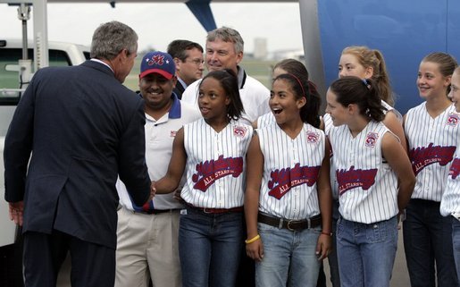 President George W. bush greets the Midway, Texas Little League Team, the 2004 Little League Softball World Series Champions before departing from Texas State Technical College AIrport in Waco, Texas on Thursday August 26, 2004. White House photo by Paul Morse.