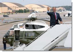 President George W. Bush boards Air Force One at Andrews Air Force Base en route to Colmar, Pa., Thursday, Sept. 9, 2004.   White House photo by Tina Hager