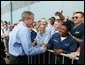 Prior to boarding Air Force One, President George W. Bush greets military personnel at Willow Grove Naval Air Station, Pa., Thursday, Sept. 9, 2004. White House photo by Tina Hager.