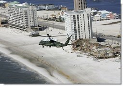President George W. Bush aboard Marine One takes an aerial tour of damage caused by Hurricane Ivan in Orange Beach, Alabama, Sunday, Sept. 19, 2004.  White House photo by Eric Draper